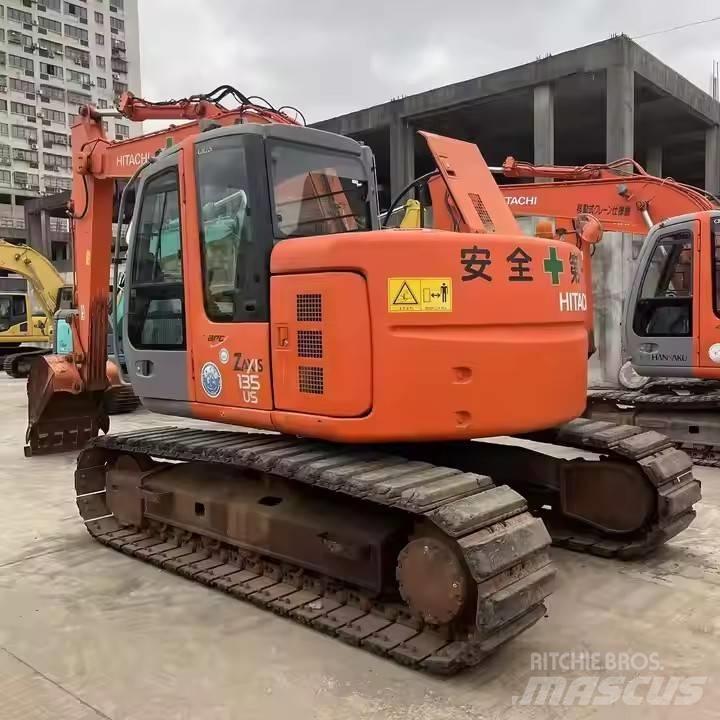 Hitachi ZX135US Bandgrävare