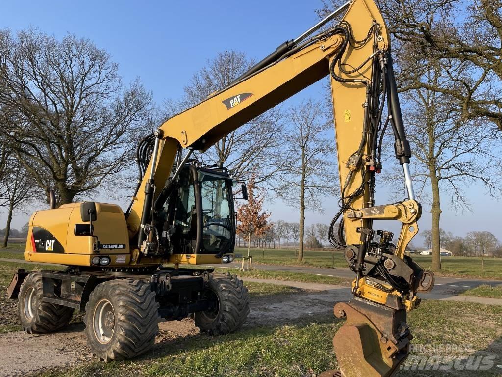 CAT M 313 D Hjulgrävare
