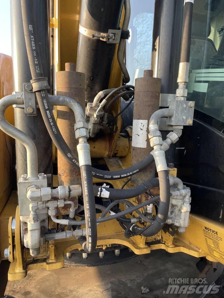 CAT M 313 D Hjulgrävare