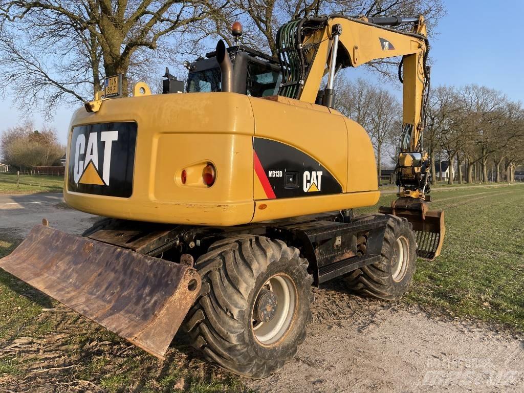 CAT M 313 D Hjulgrävare
