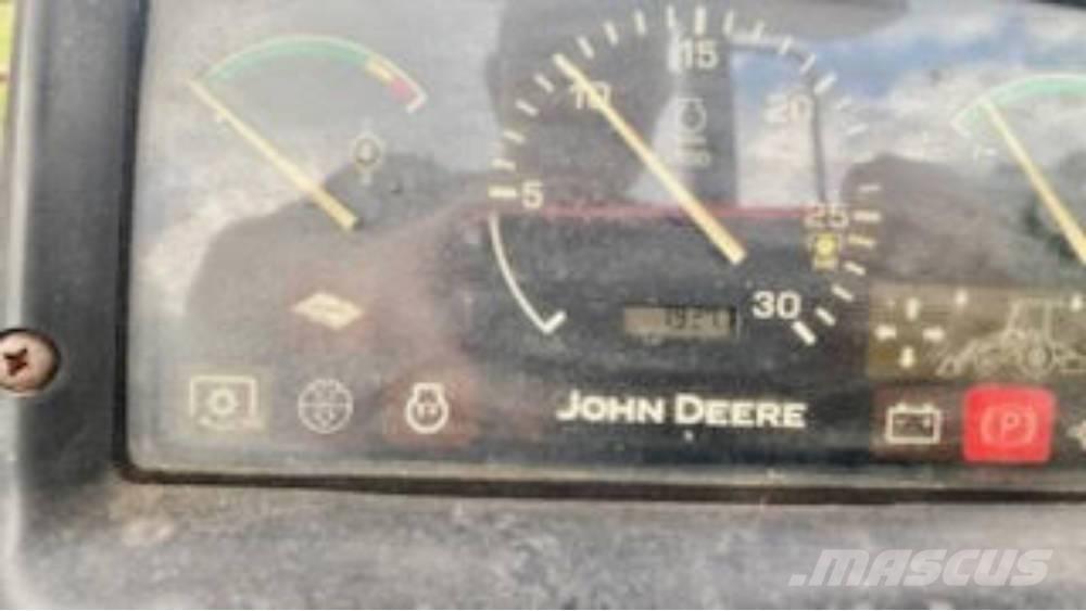 John Deere 110 Grävlastare