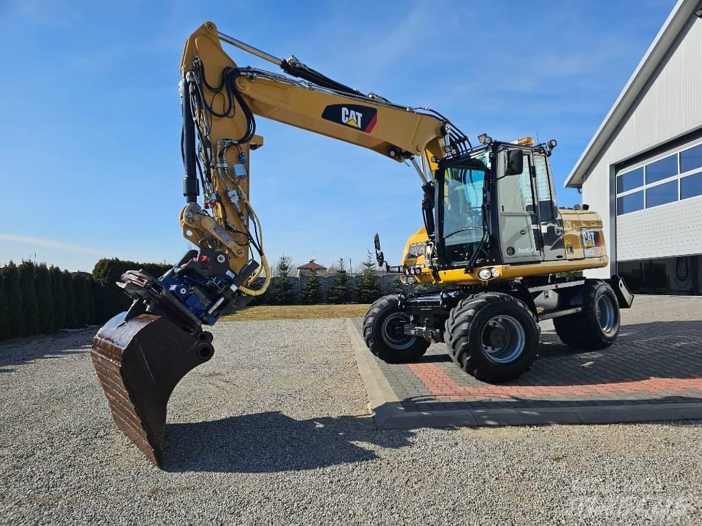 CAT M 313 D Hjulgrävare
