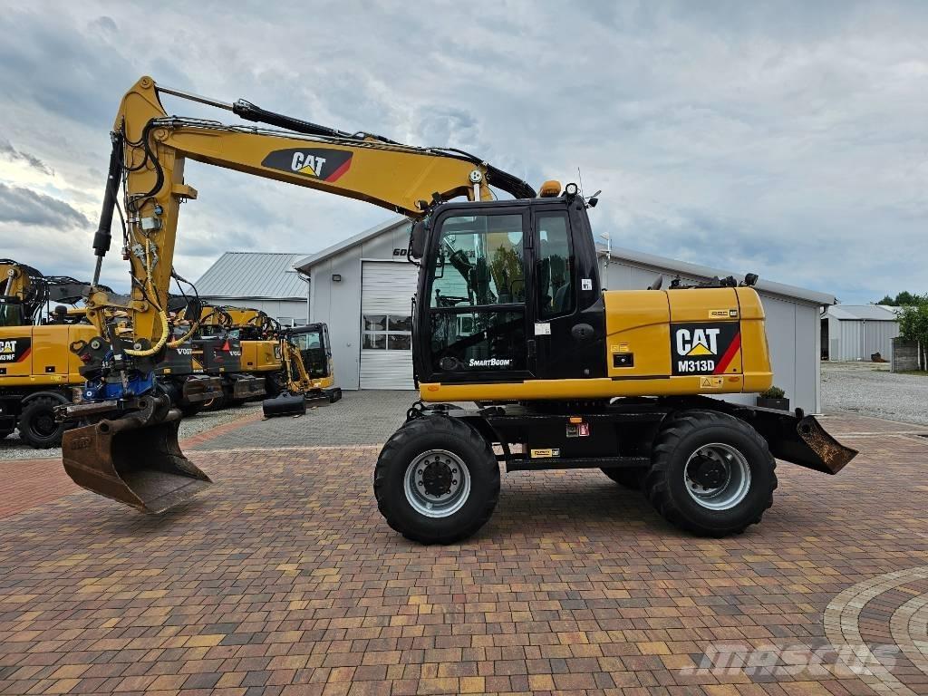 CAT M 313 D Hjulgrävare