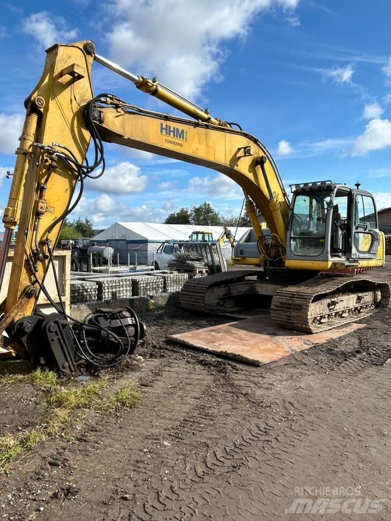 New Holland E 265 Bandgrävare