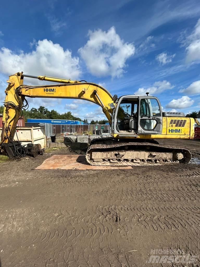 New Holland E 265 Bandgrävare