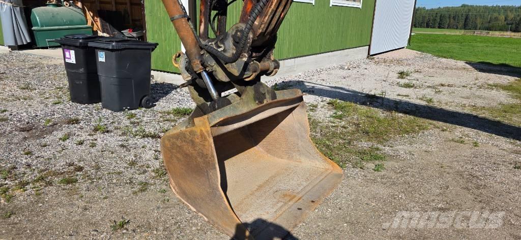 Doosan DX 225 LC Bandgrävare