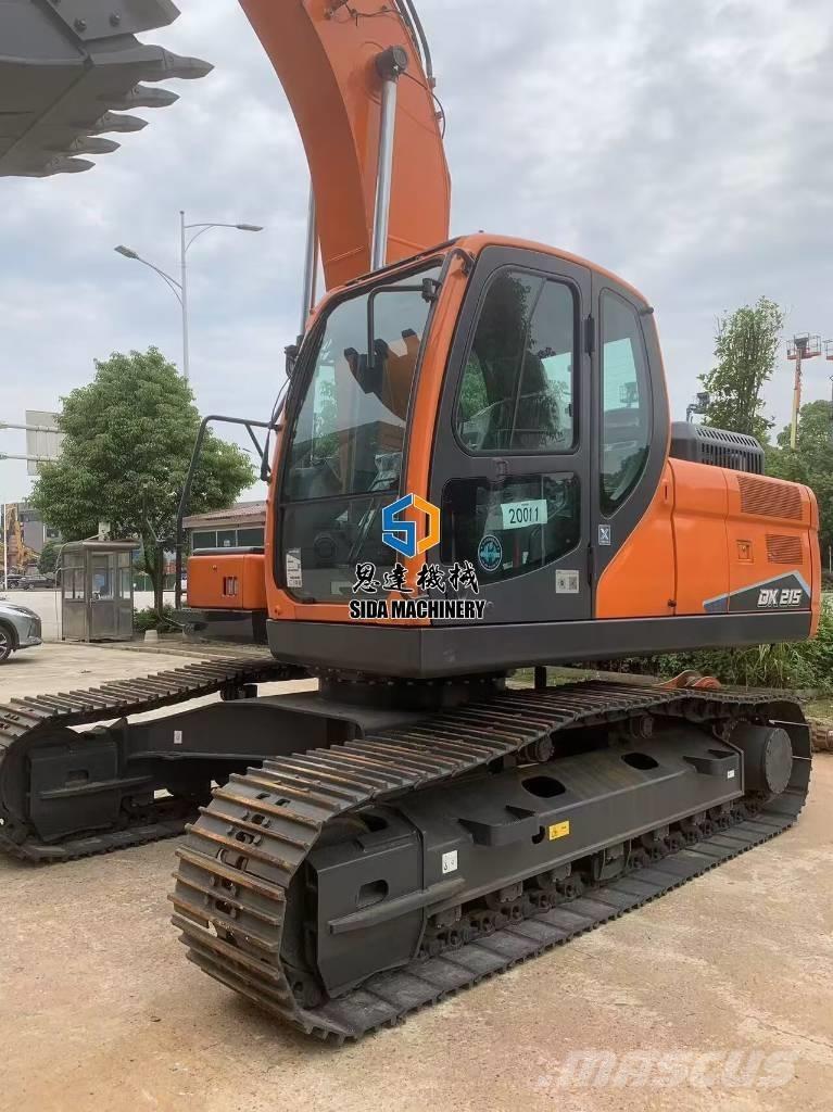 Develon DX 215 Midigrävmaskiner 7t - 12t