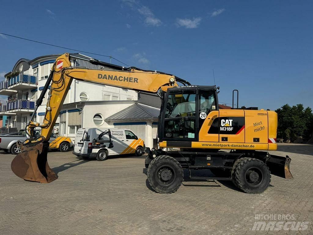 CAT M 318 F Hjulgrävare