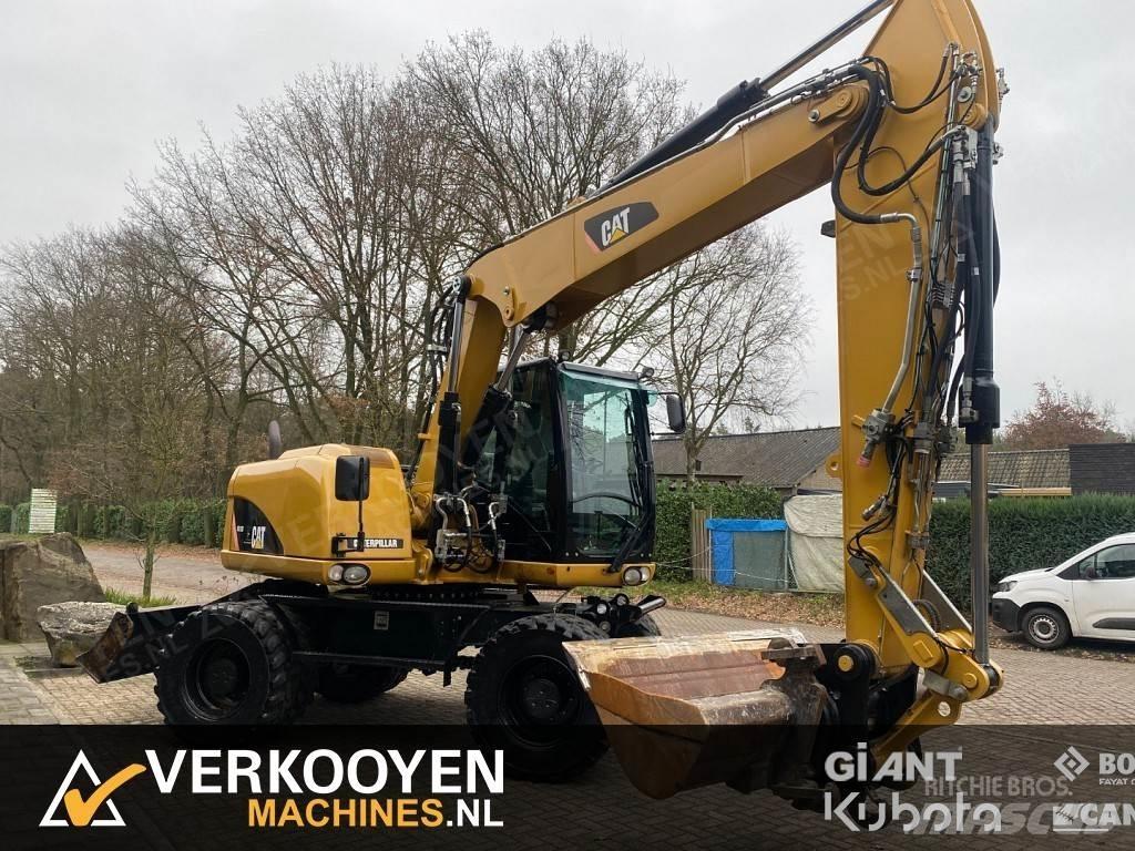 CAT M313D Hjulgrävare