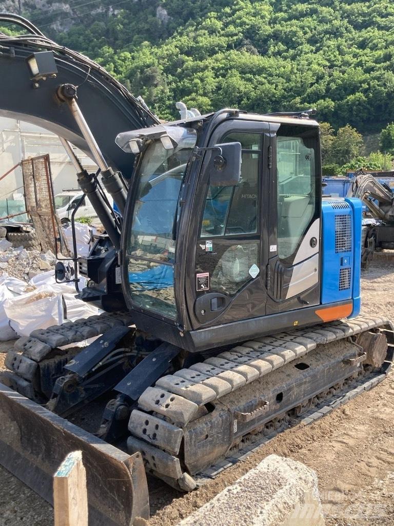 Hitachi ZX 135 US-6 Bandgrävare