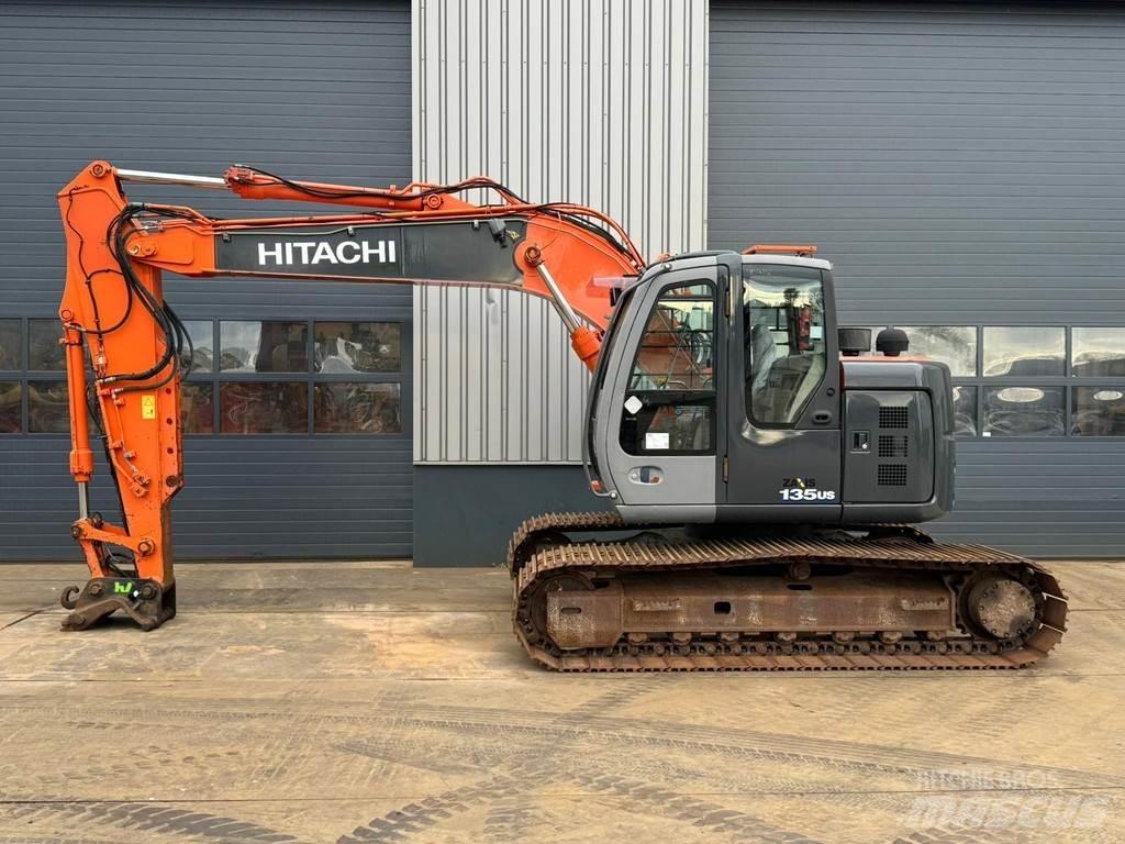 Hitachi ZX135US Bandgrävare