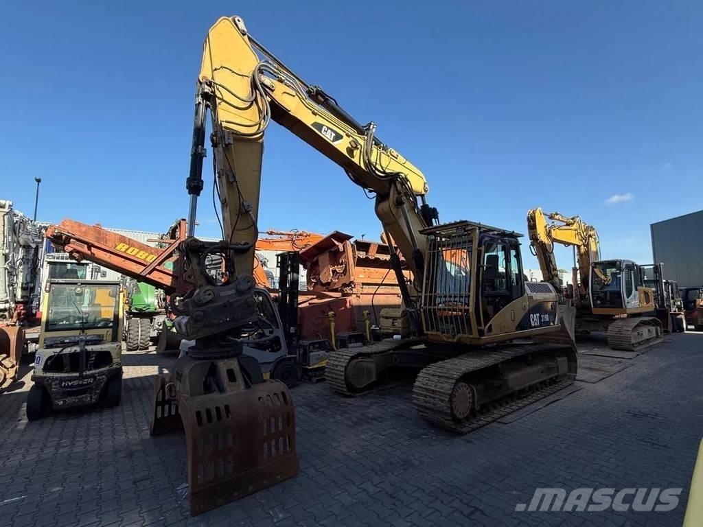CAT 319D Bandgrävare