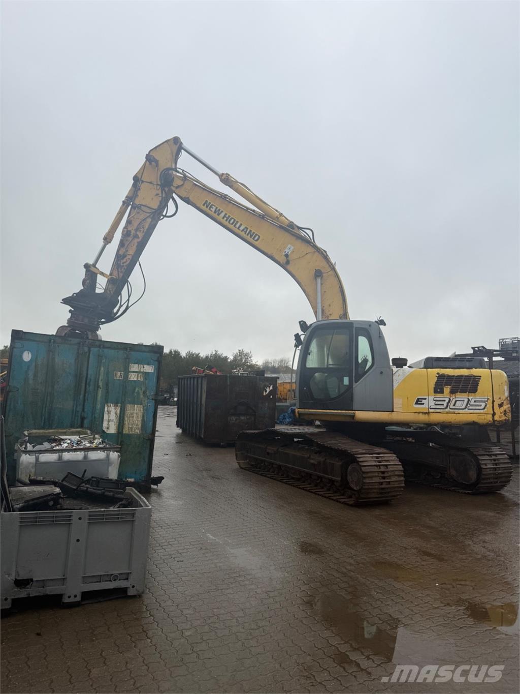 New Holland E305 Bandgrävare