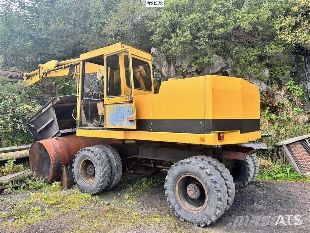 CAT 212B Hjulgrävare