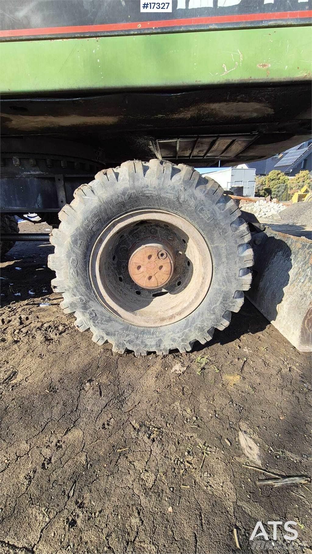 CAT 212BFT Hjulgrävare