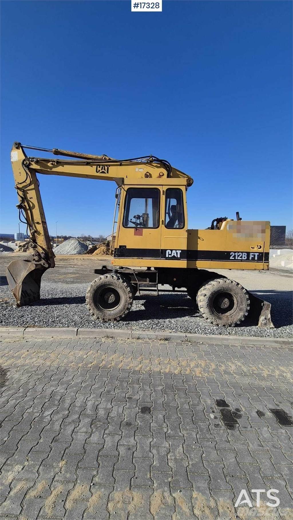 CAT 212BFT Hjulgrävare
