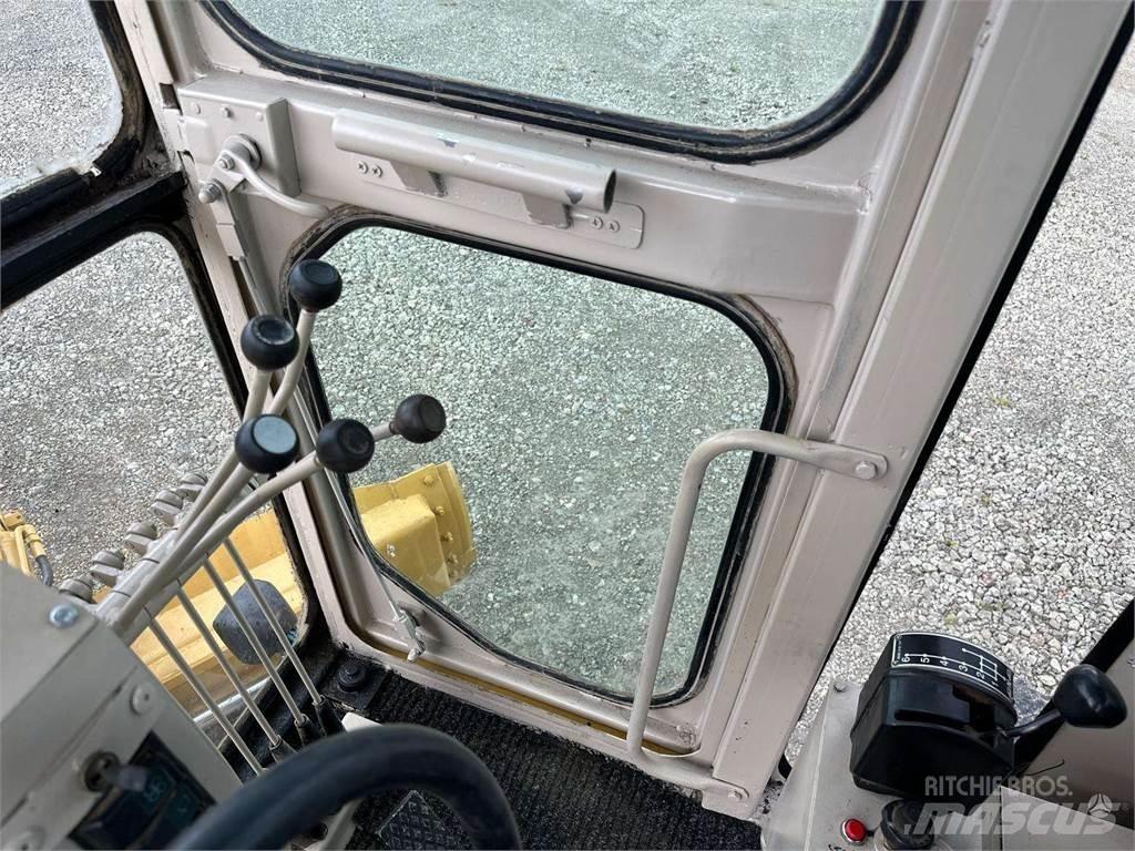 CAT 140 H Väghyvlar