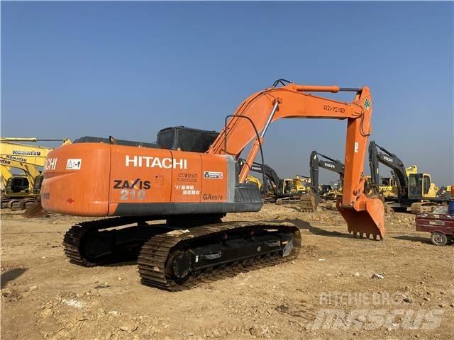 Hitachi ZX210 Bandgrävare