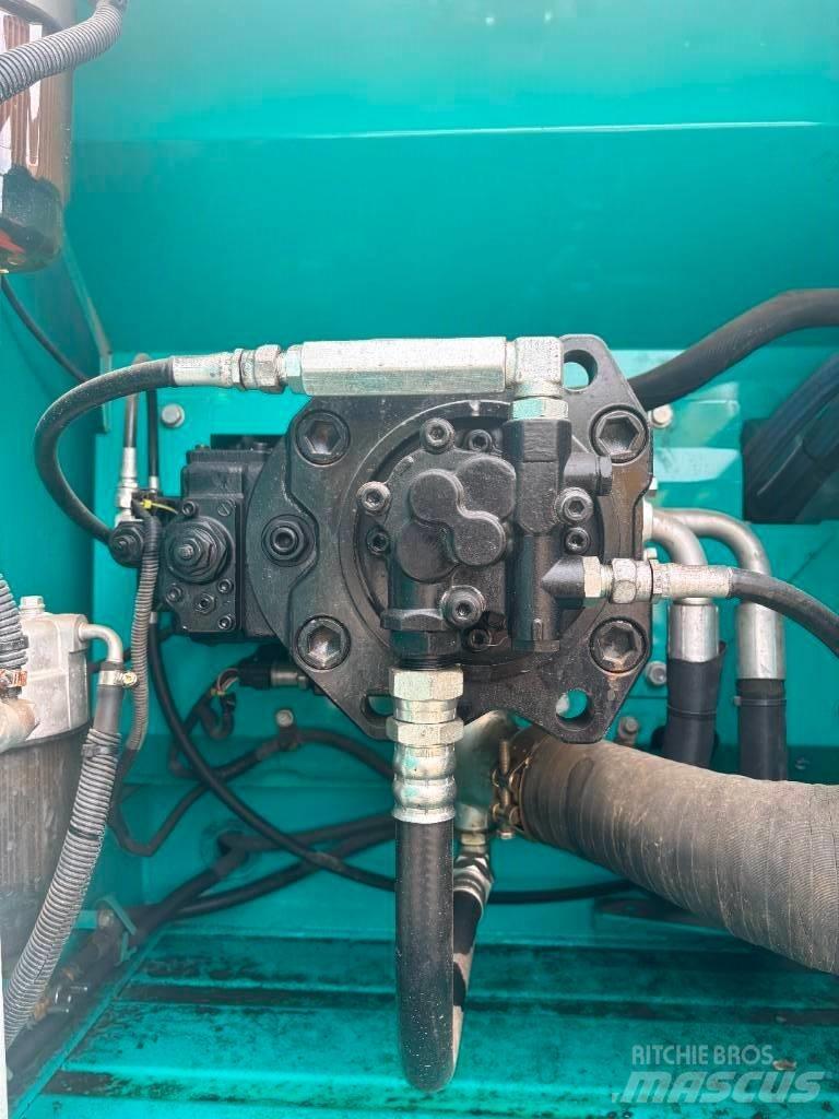 Kobelco SK 210 Bandgrävare