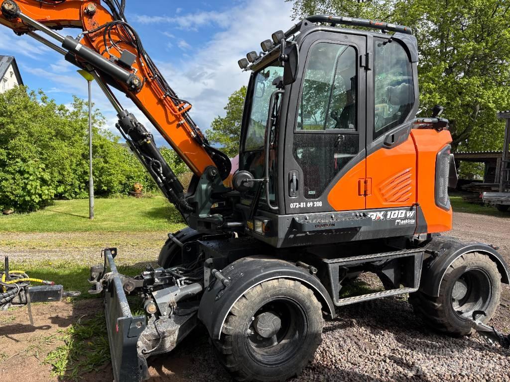 Develon DX 100 W-7 Hjulgrävare