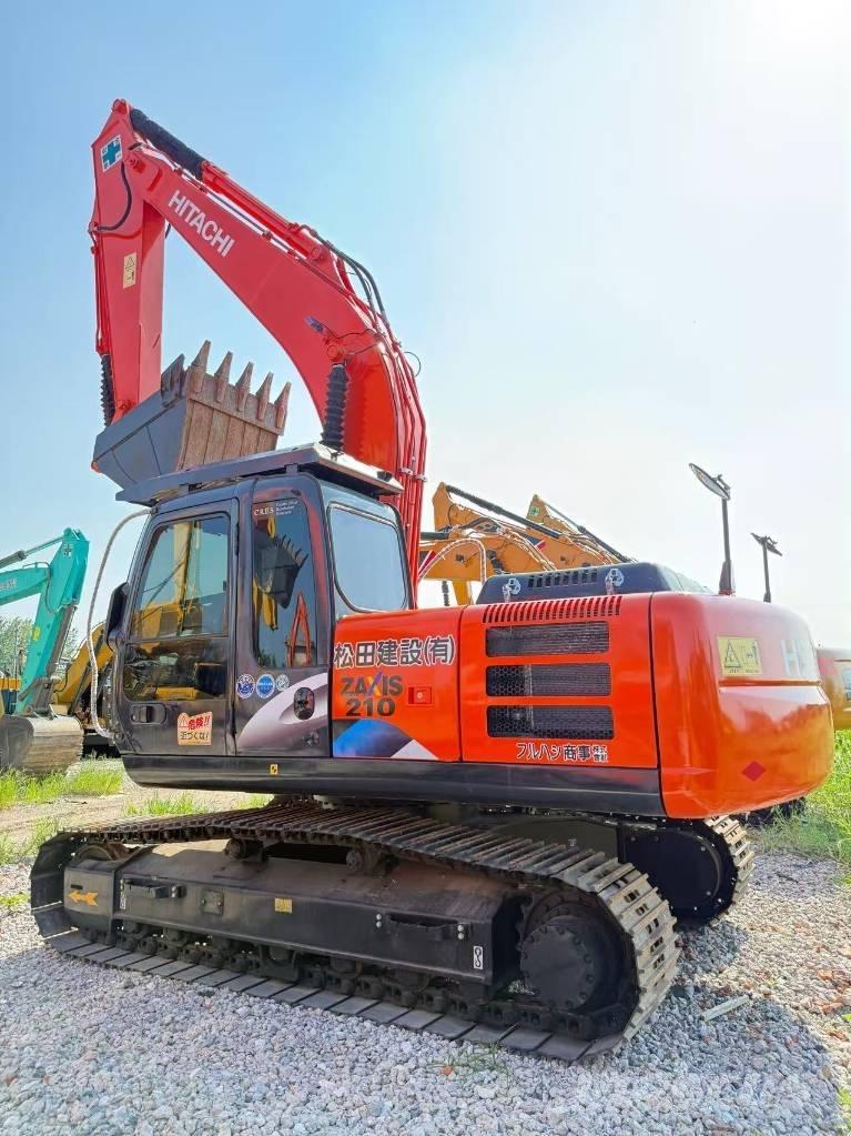 Hitachi ZX 210 Bandgrävare