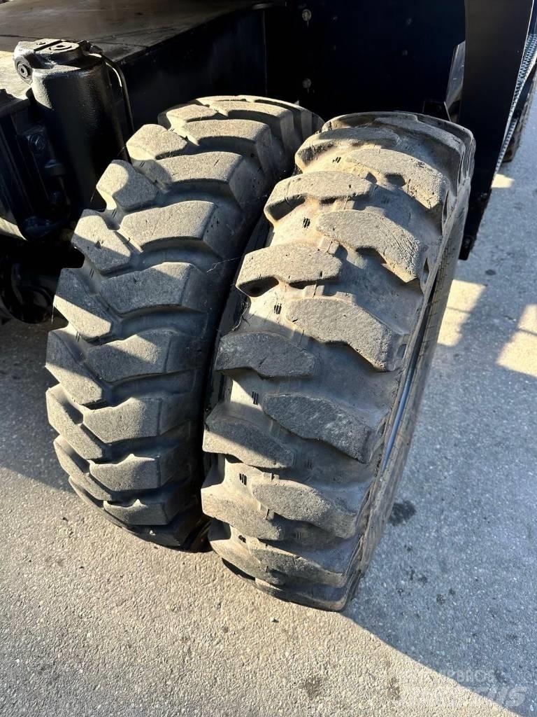 CAT M 318 F Hjulgrävare