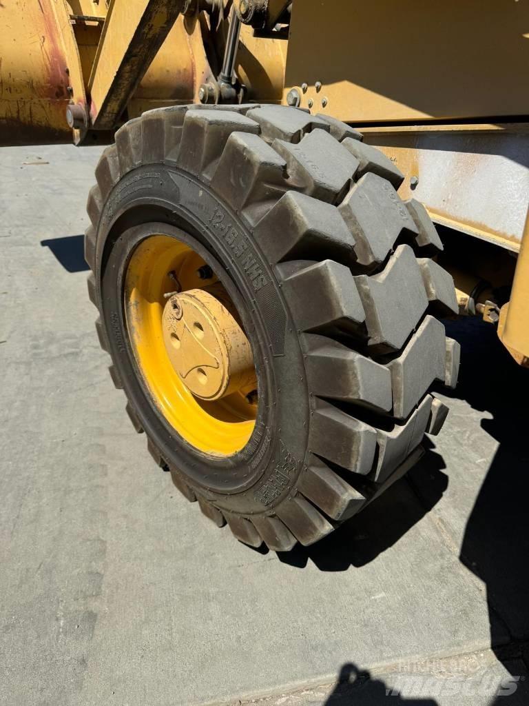 John Deere 310 G Grävlastare