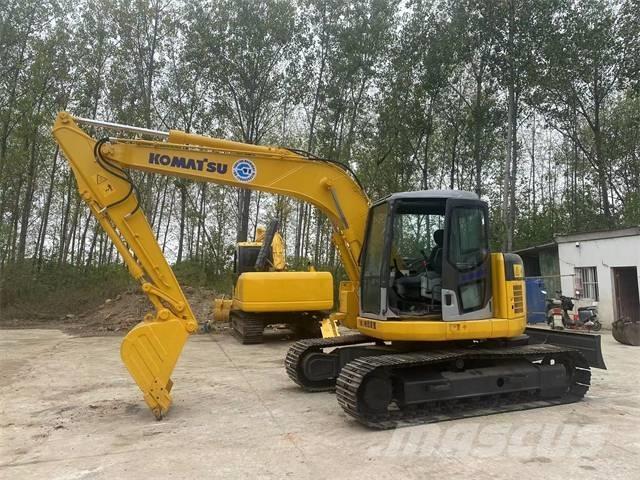Komatsu PC128US Bandgrävare
