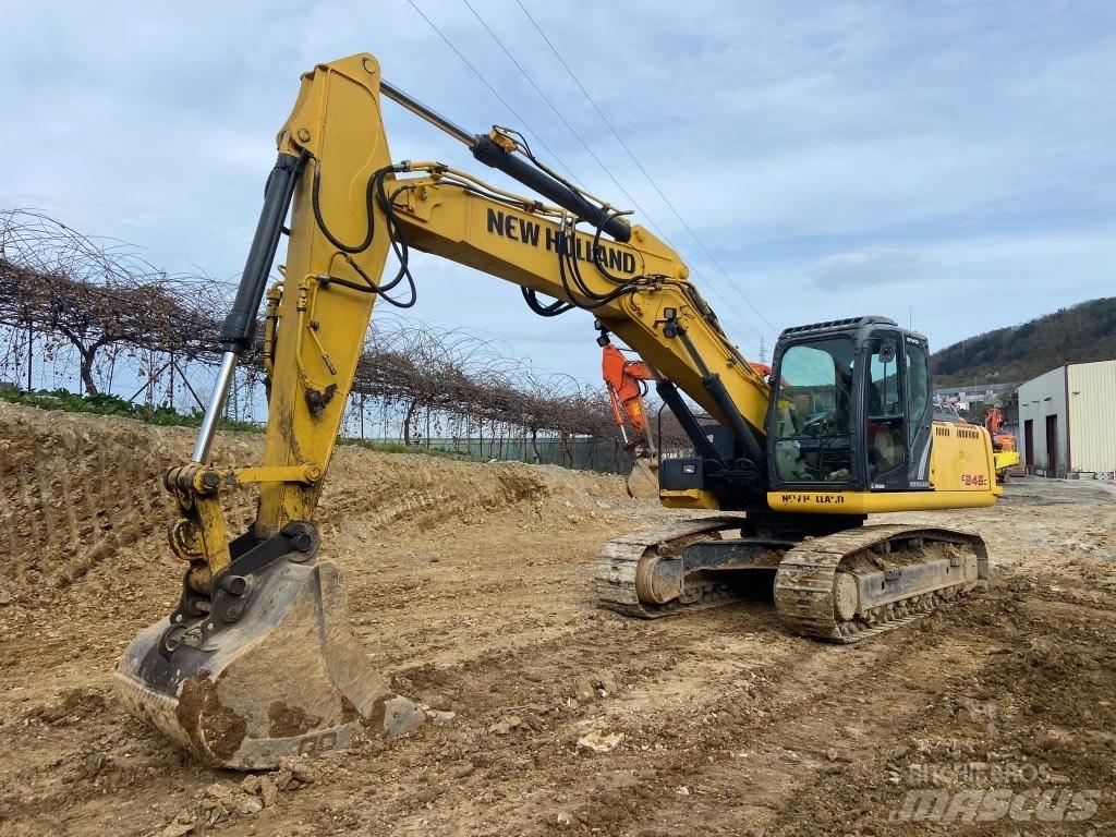 New Holland E245 Bandgrävare