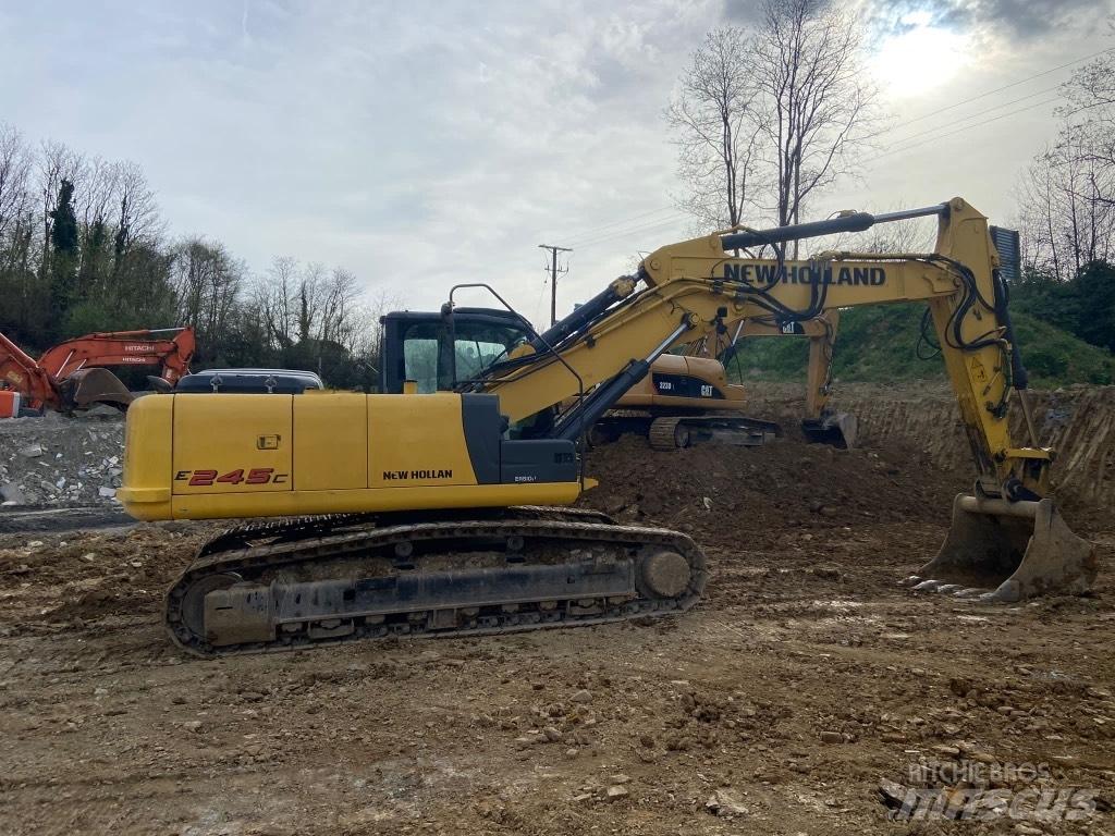New Holland E245 Bandgrävare