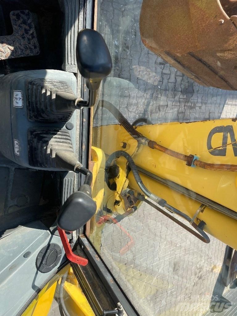 New Holland LB 110 Grävlastare
