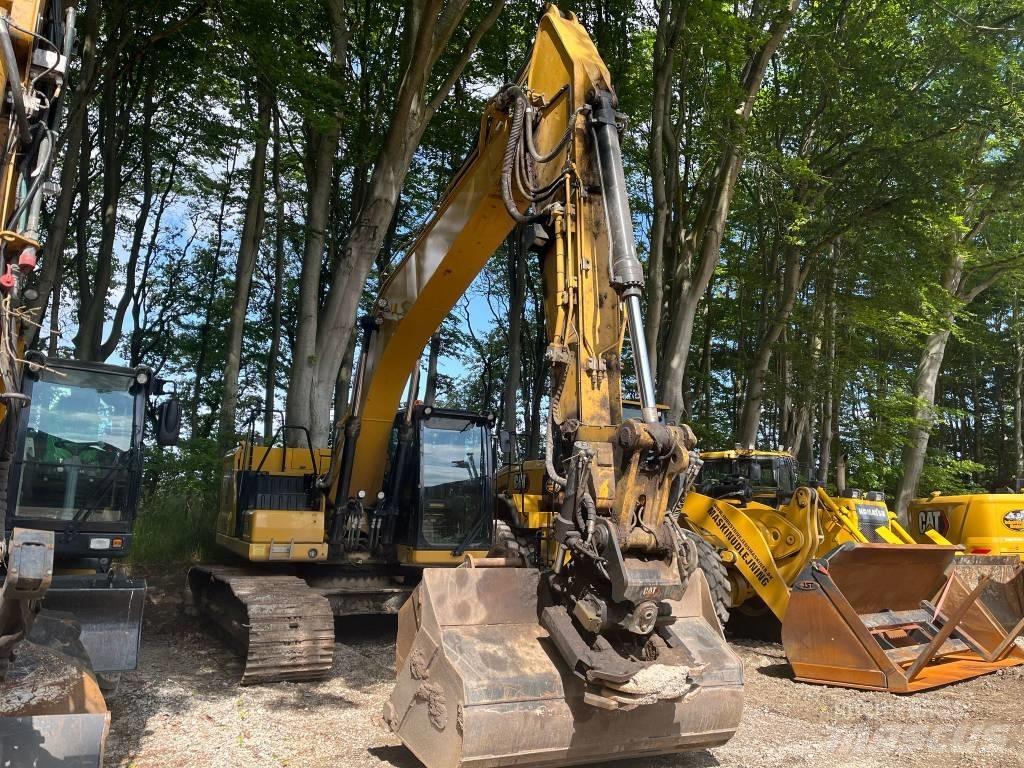 CAT 323 Bandgrävare