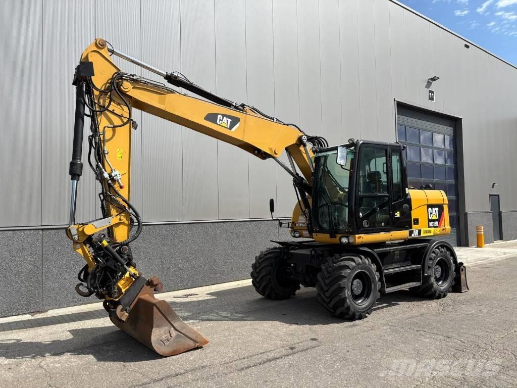 CAT M 313 D Hjulgrävare