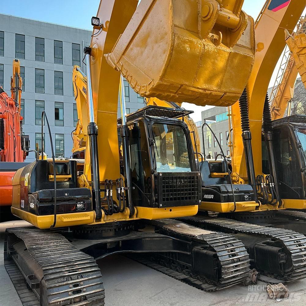 CAT 323 D Bandgrävare