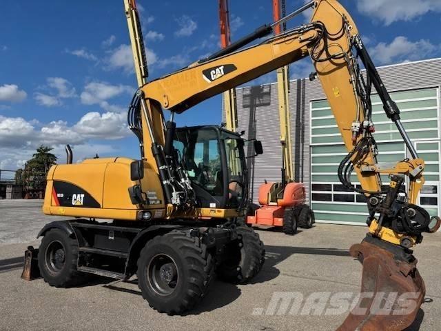 CAT M 313 D Hjulgrävare