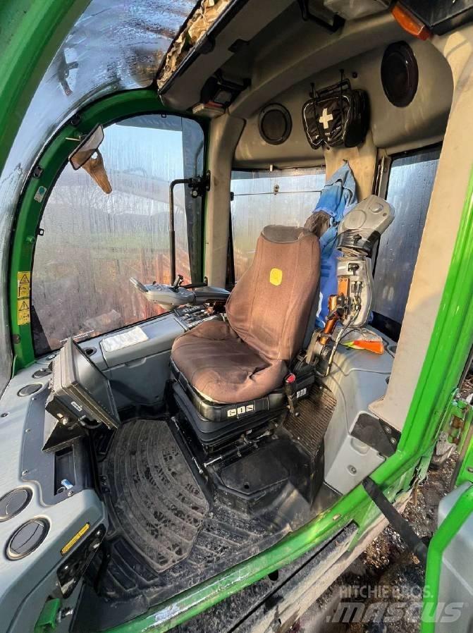 John Deere 1110 E Skotare