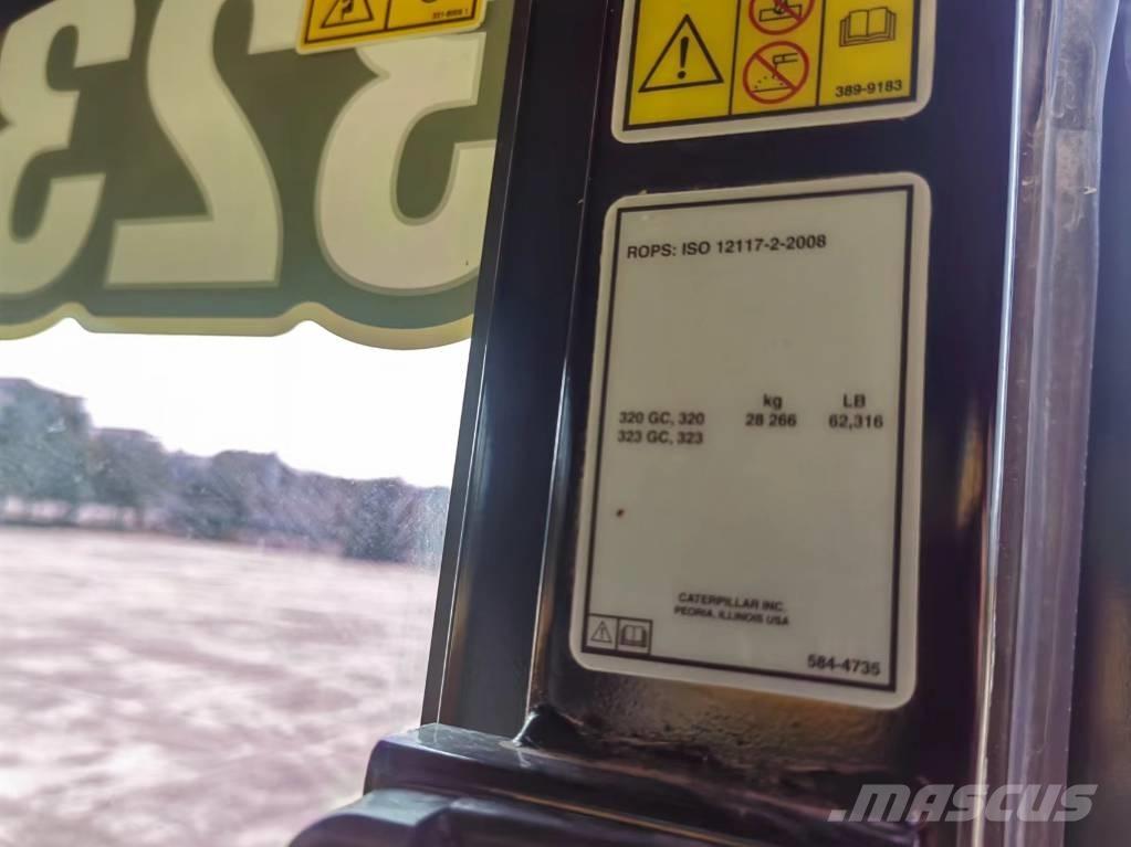 CAT 2022 CAT 323 Hjulgrävare