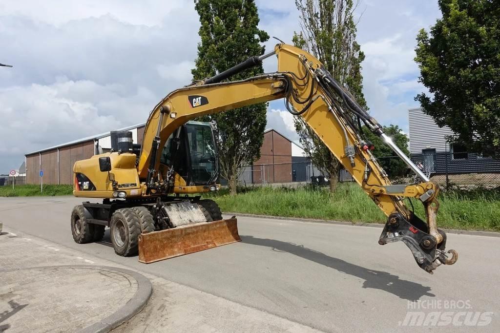 CAT M313 D Hjulgrävare