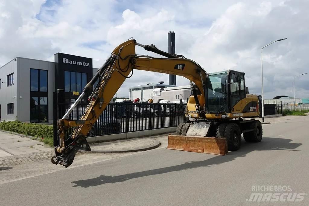 CAT M313 D Hjulgrävare