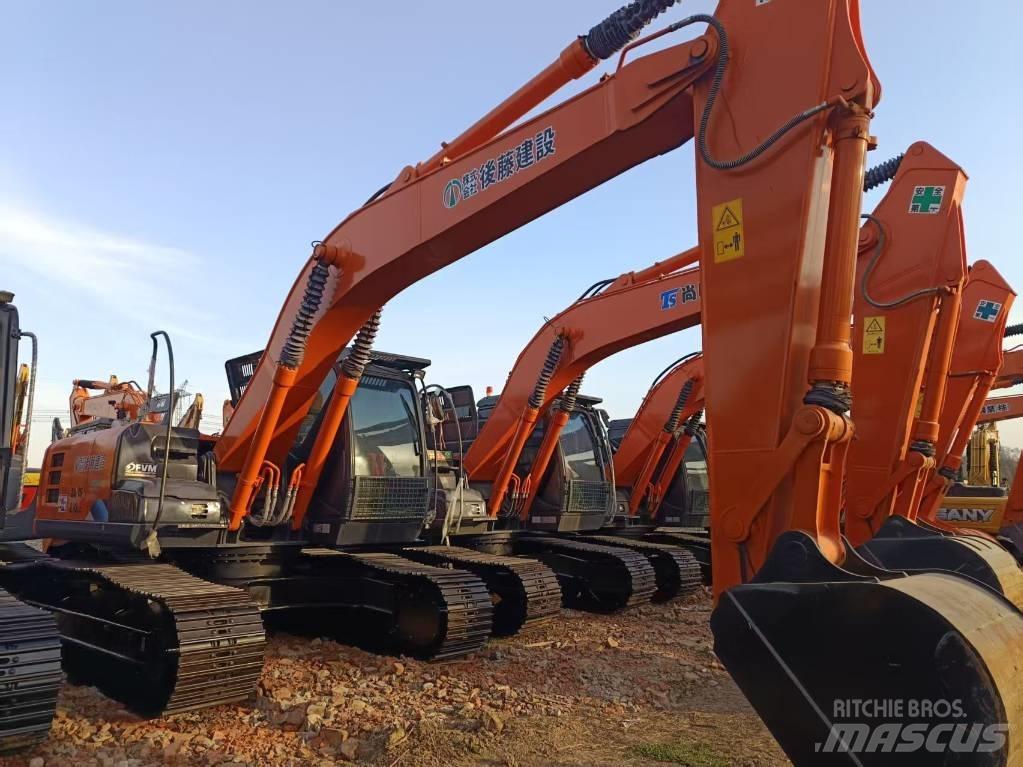 Hitachi ZX210 Bandgrävare