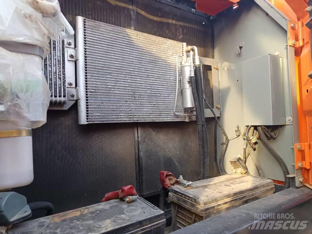 Hitachi ZX210 Bandgrävare