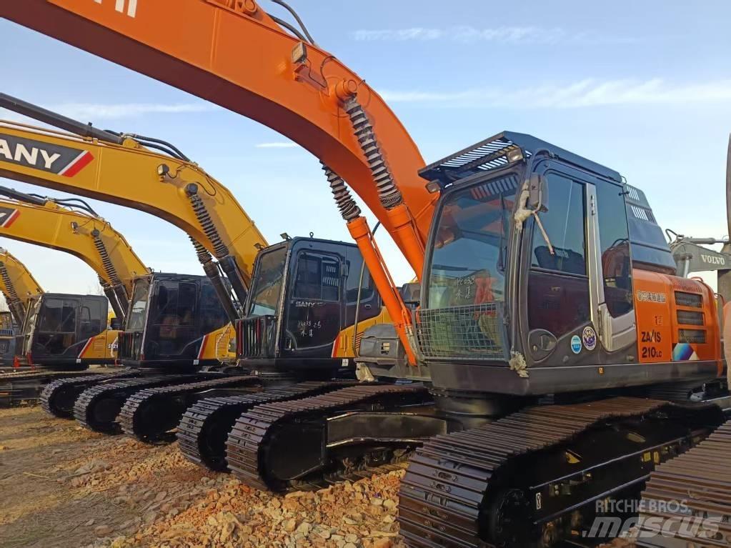 Hitachi ZX210 Bandgrävare