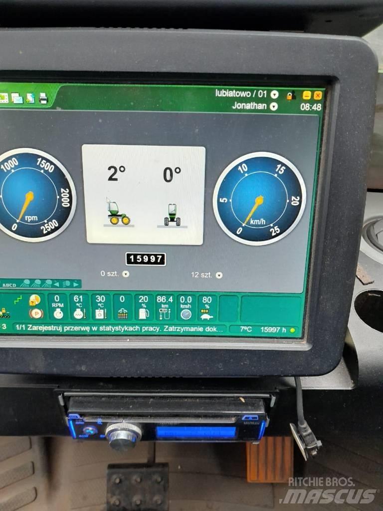 John Deere 1110 E Skotare