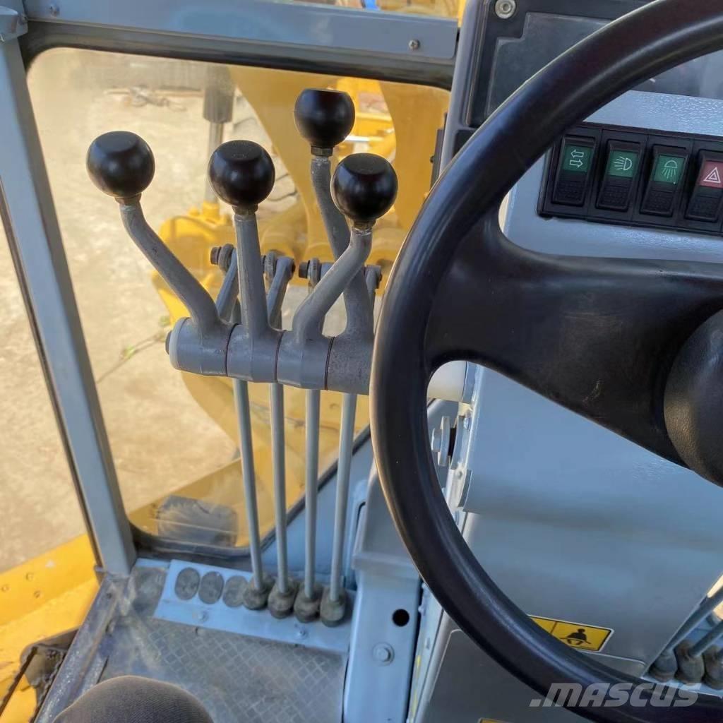 CAT 140 K Väghyvlar