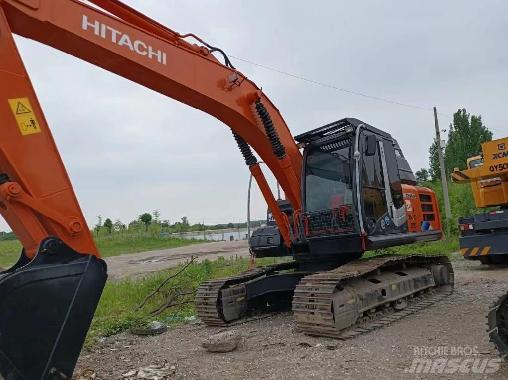 Hitachi ZX210 Bandgrävare