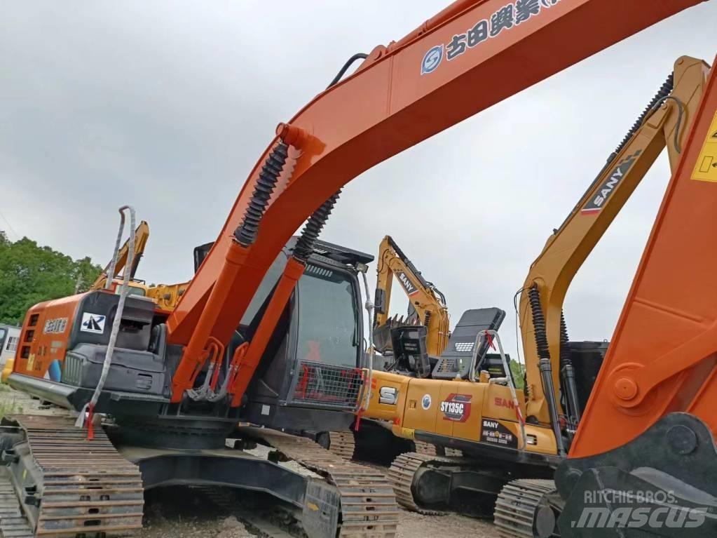 Hitachi ZX210 Bandgrävare