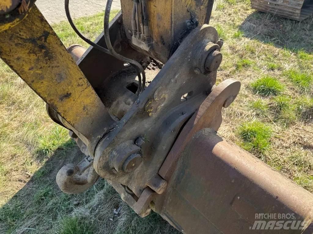 New Holland E215 Bandgrävare