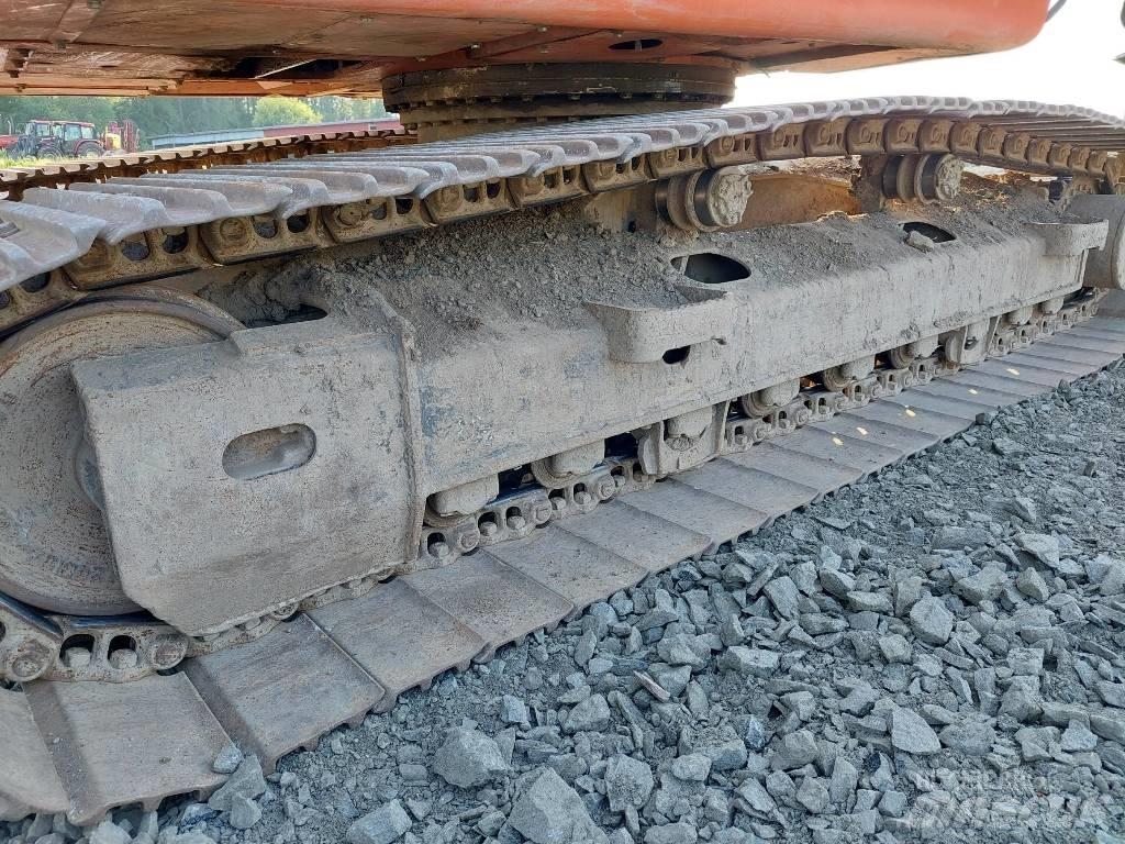 Doosan DX 225 LC Bandgrävare