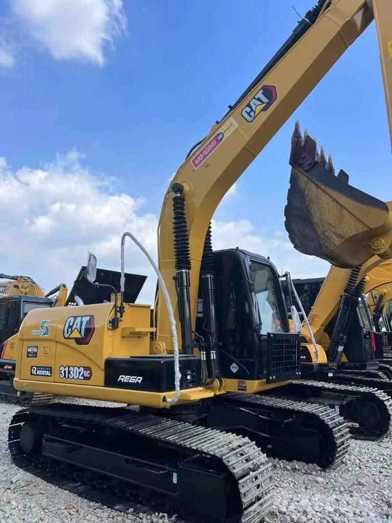 CAT 313 Bandgrävare