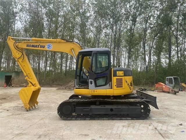 Komatsu PC128US Bandgrävare
